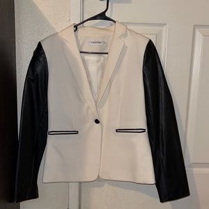 White Calvin Klein blazer with black leather sleeve